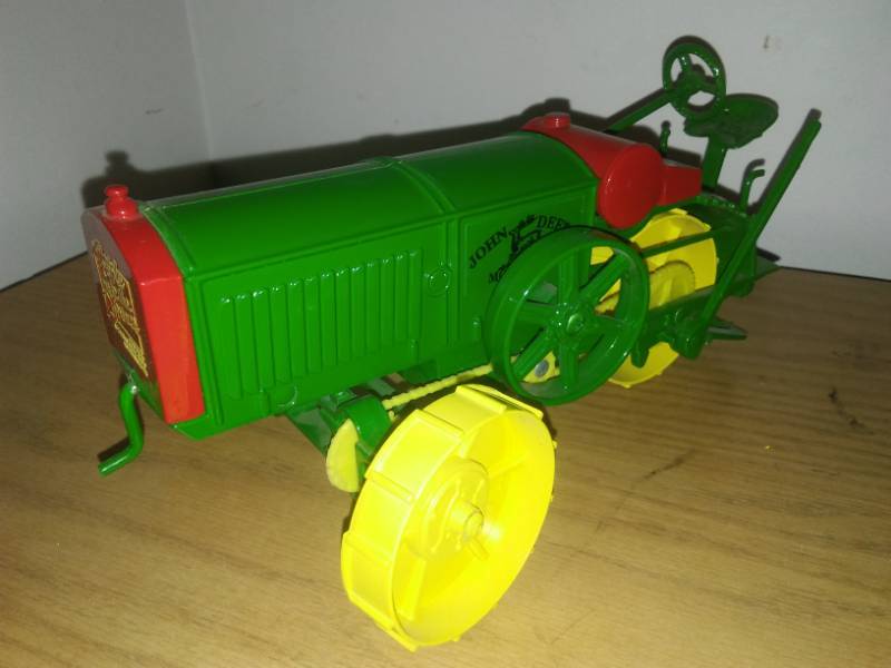 lot 110 image: John Deere three wheel tractor