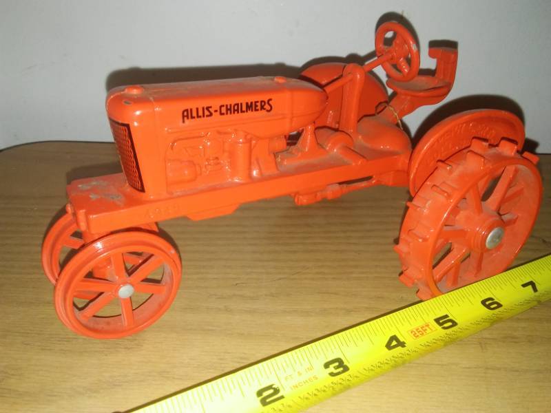 lot 123 image: Allis Chalmers steel wheel tractor.