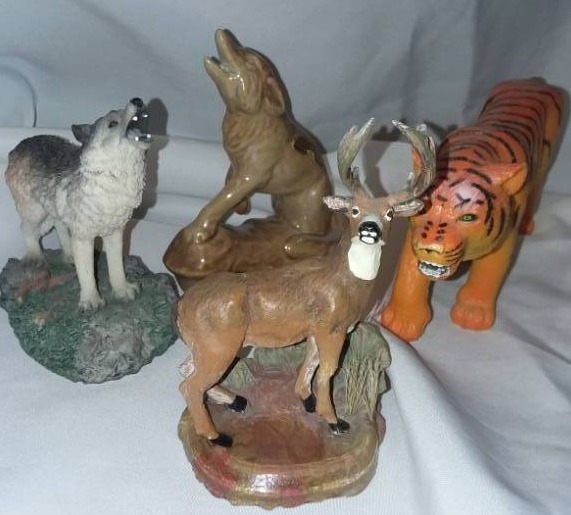 lot 170 image: Resin-like wildlife figurines (4)