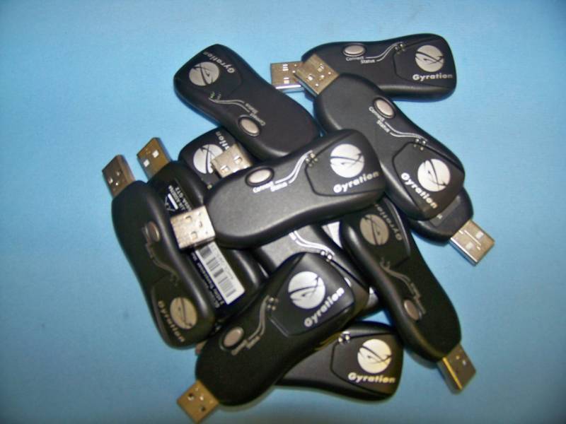 lot 110 image: (10) Gyration, Wireless Controllers with Charging Bases and 2.4 GHz USB Tranceivers