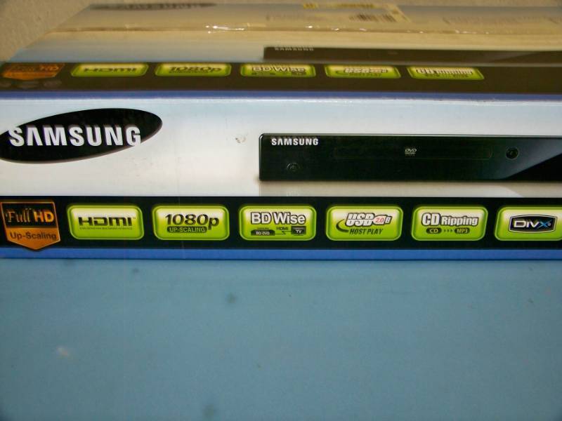 lot 86 image: Samsung, DVD Player with Remote Control in Original Box