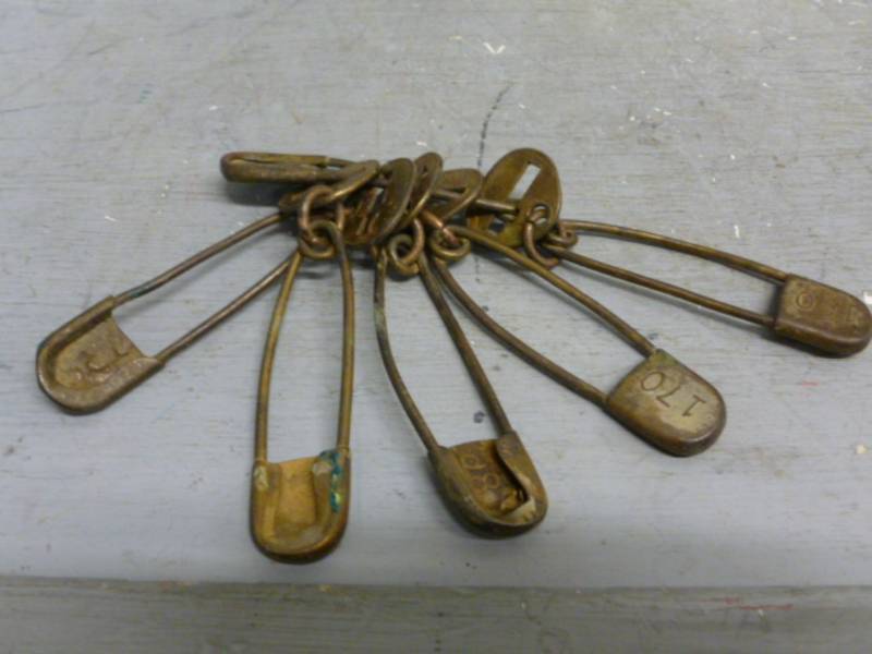 lot 147 image: Antique Brass Pins