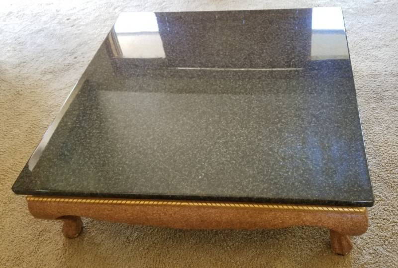 lot 39 image: Black Granite Top Coffee Table with Paw Foot Base