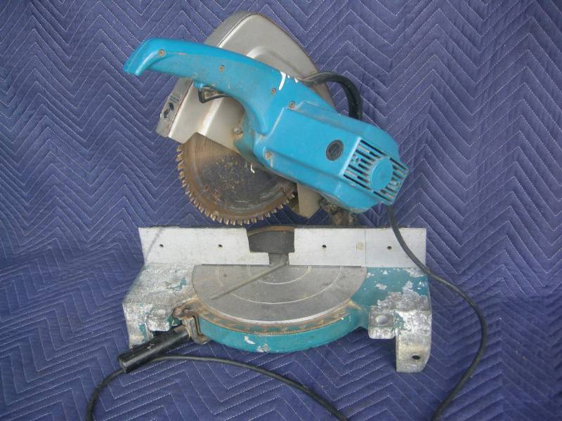 lot 23 image: Ryobi 10 Miter Saw