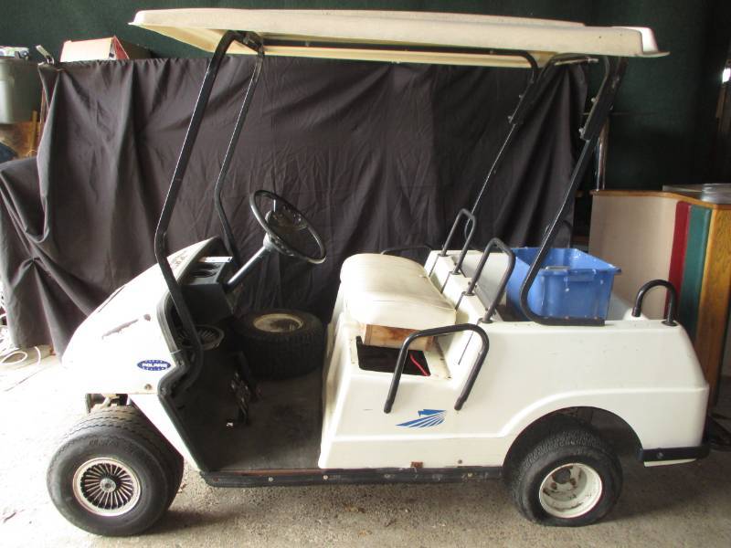 lot 2 image: Golf Cart extra wheel and rim No batteries unable to test.
