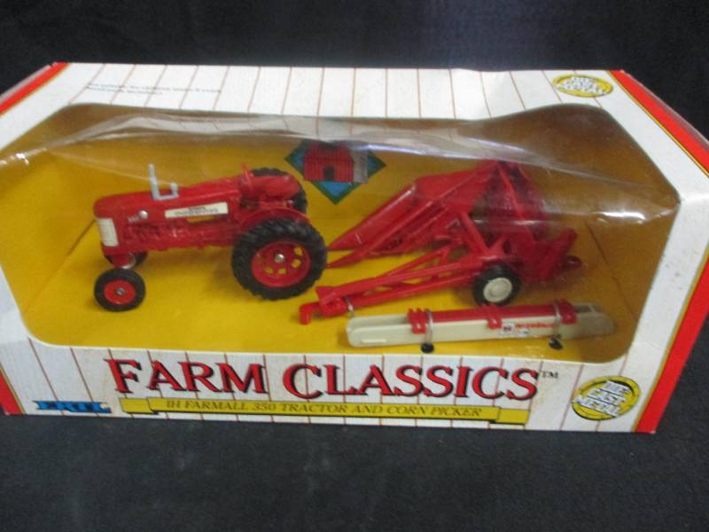 lot 48 image: Ertl IH Farmall 350 Tractor and Corn Picker Die Cast Metal