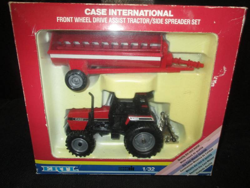 lot 51 image: Ertl Case International  132 Scale Diecast tractor and spreader