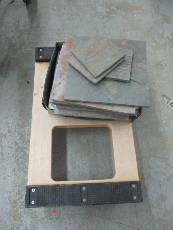 lot 145 image: 10 squares of slate tile and cart they are on