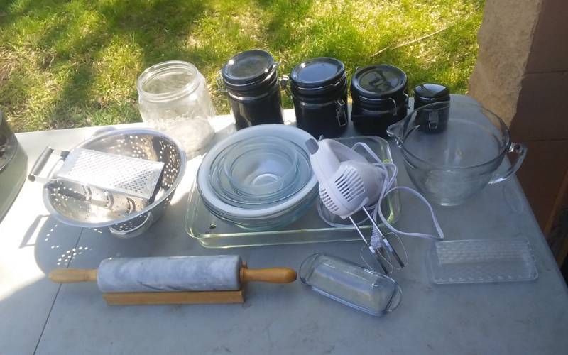 lot 35 image: Kitchen Misc. Pampered Chef Glass Measure, Assorted Pyrex, Grater, Colander, Marble Rolling Pin & Canisters