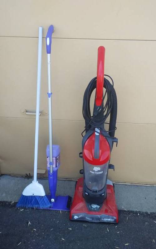 lot 40 image: Dirt Devil Bagless Vacuum, Swiffer Wet Broom