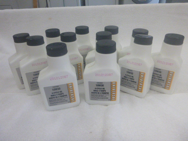 lot 35 image: 12 Bottles of Universal 10W30 4-Cycle Oil