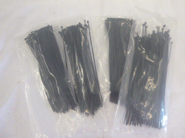 lot 54 image: 4 Bags of 8 Zip Ties