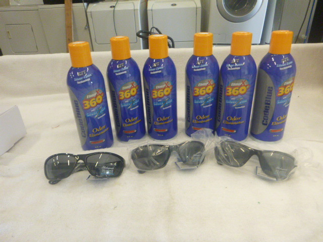 lot 184 image: 6 Cans of Odor Eliminator and 3 Pair of Sunglasses