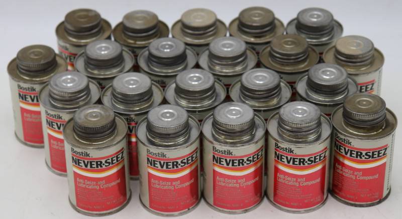 lot 68 image: Lot of (21) Bottles of Never-Seez Anti-Seez Lubricant