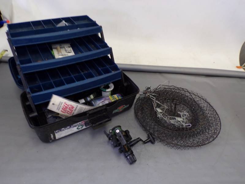 lot 34 image: Tackle Box with supplies and reel