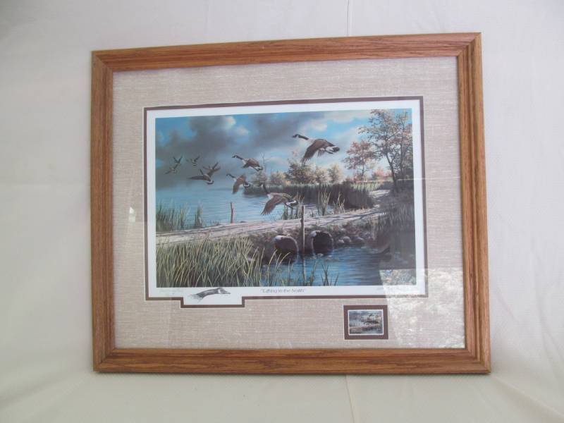lot 24 image: Ken Zila Print Lifting to the North Commeriative Print wstamp 1987, 21x25