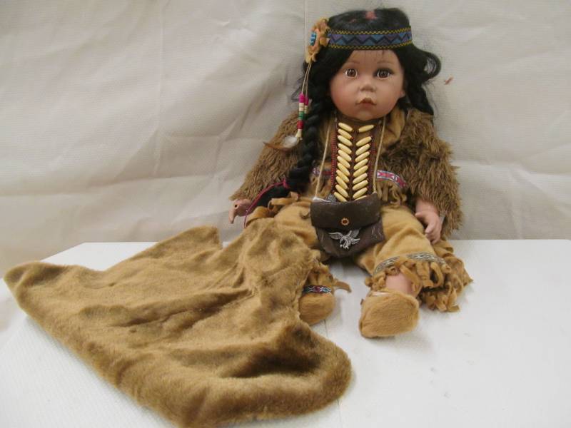 lot 154 image: Native American doll w fur blanket 21long