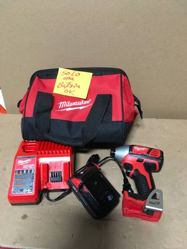 lot 52 image: Milwaukee M18 18-Volt Lithium-Ion Cordless Impact Driver Combo Kit  w(1) 1.5Ah Batteries, Charger, Tool Bag in good condition
