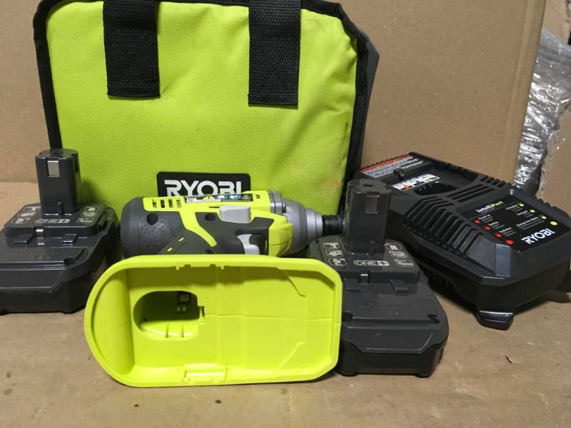 lot 86 image: RYOBI 18-Volt ONE Lithium-Ion Cordless 14 in. Impact Driver Kit with (2) 1.3 Ah Batteries, Dual Chemistry Charger, Tool Bag in good condition