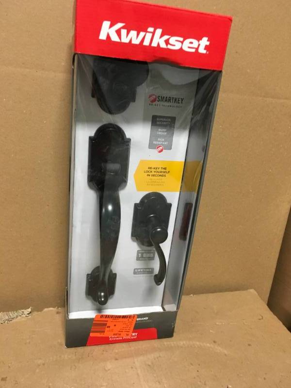 lot 19 image: Kwikset Austin Venetian Bronze Single Cylinder Door Handleset with Austin Entry Door Lever Featuring SmartKey Security  in good condition