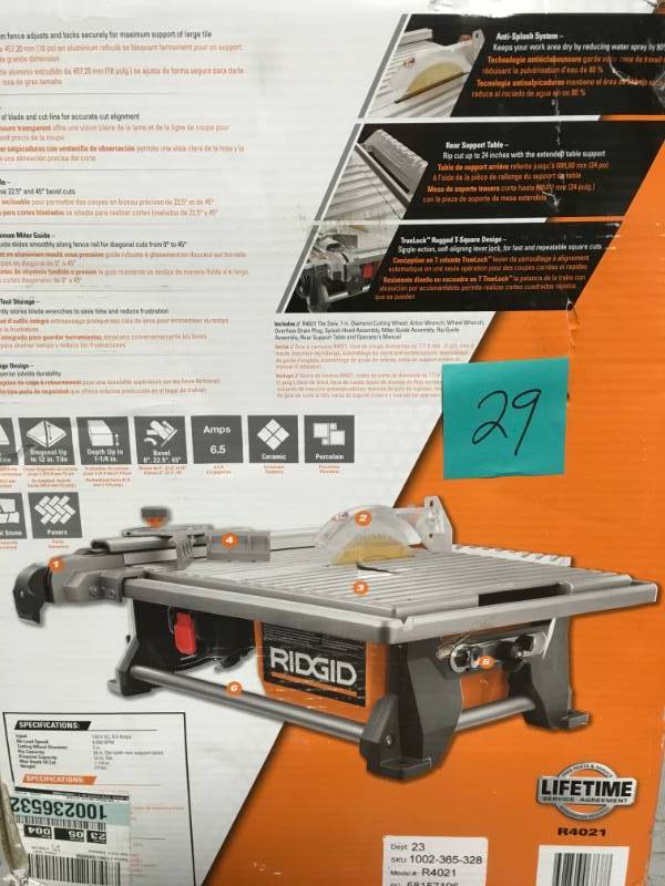 lot 29 image: RIDGID 6.5 Amp Corded 7 in. Table Top Wet Tile Saw  in good condition