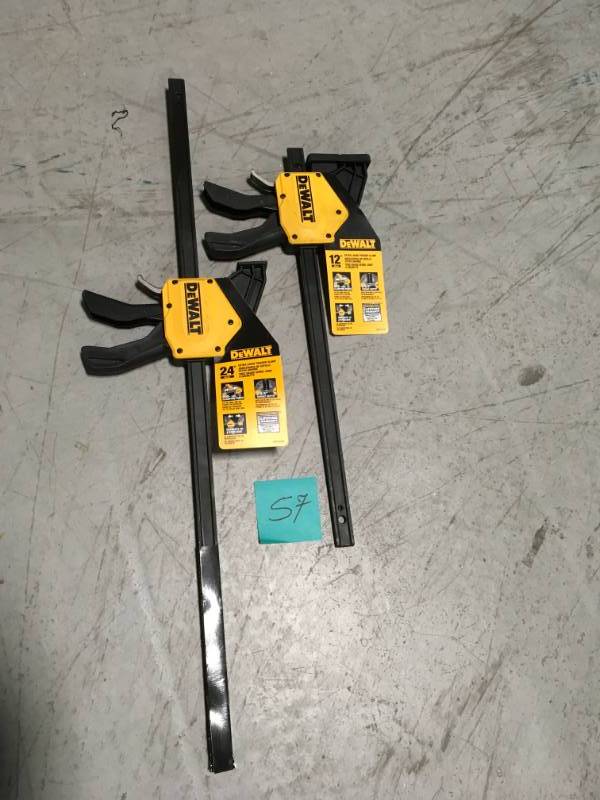 lot 57 image: DEWALT 12 in. 600 lb. Trigger Clamp w3.75 in. Throat Depth QTY 2  in good condition