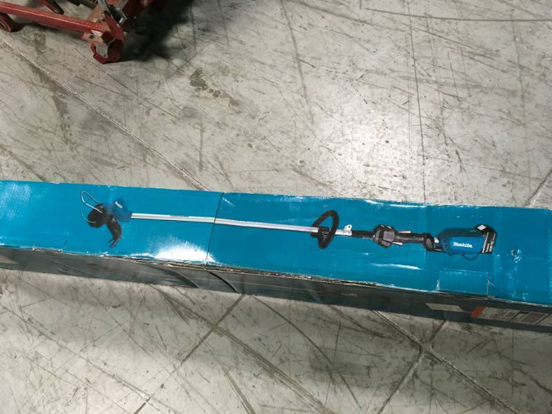 lot 99 image: Makita 18-Volt LXT Lithium-Ion Brushless Cordless String Trimmer Kit with (1) Battery 4.0Ah and Charger  in good condition