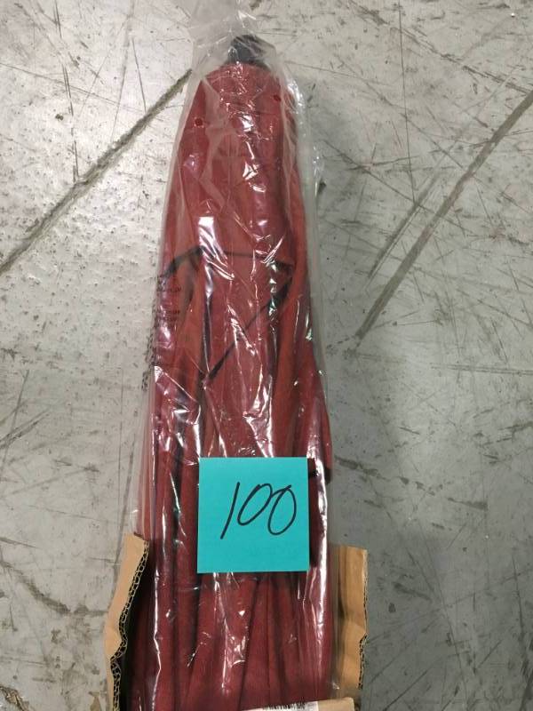 lot 100 image: 10 ft. x 6 ft. Aluminum Patio Umbrella in Chili not used