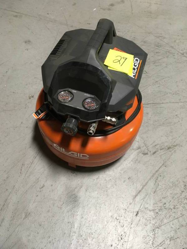 lot 29 image: RIDGID 6 Gal. Portable Electric Pancake Air Compressor in Good Condition