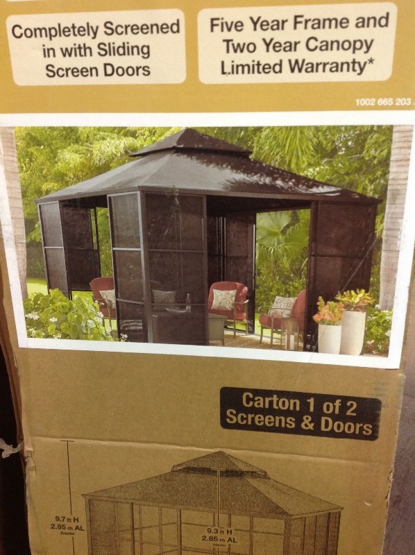lot 111 image: Hampton Bay 11 ft. x 11 ft. Aluminum Full Screen Sliding Door Gazebo in good conditions
