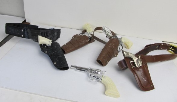 lot 48 image: Group of Vintage Toy Cap Guns & Holsters