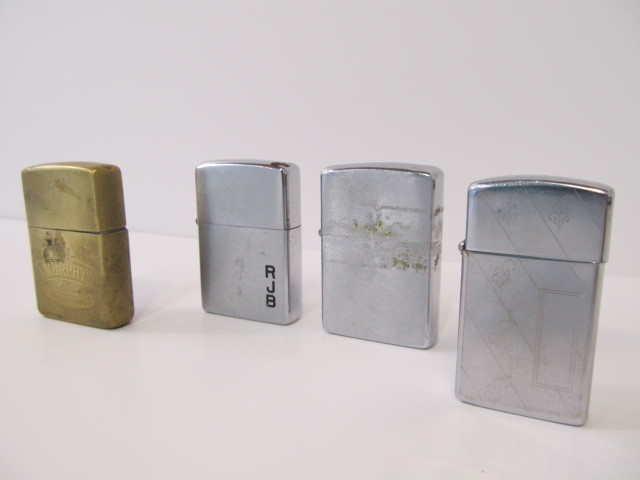 lot 113 image: Group of 4 ZIPPO Lighters