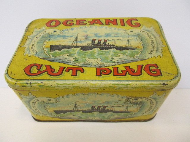 lot 140 image: Antique OCEANIC Cut Plug Advertising Tobacco Tin