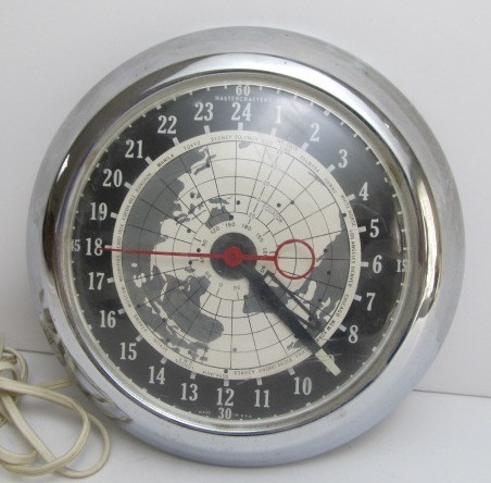 lot 76 image: Cool Vintage Mid Century MASTERCRAFTERS Chrome World Wall Clock