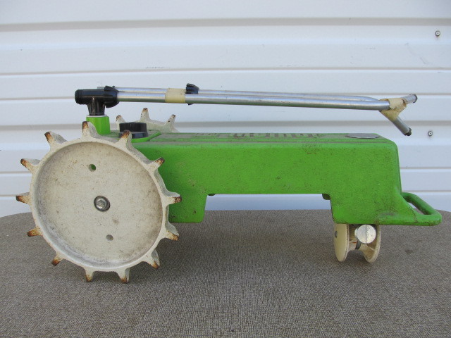 lot 234 image: Vintage Cast Iron Tractor Sprinkler