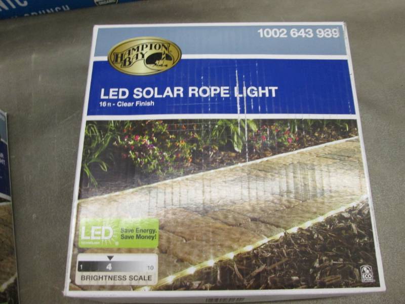 lot 41 image: Hampton Bay Solar Powered 16 ft. Cl...