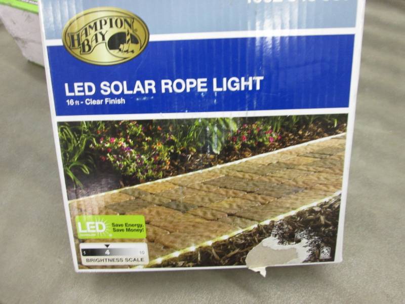 lot 49 image: Hampton Bay Solar Powered 16 ft. Cl...