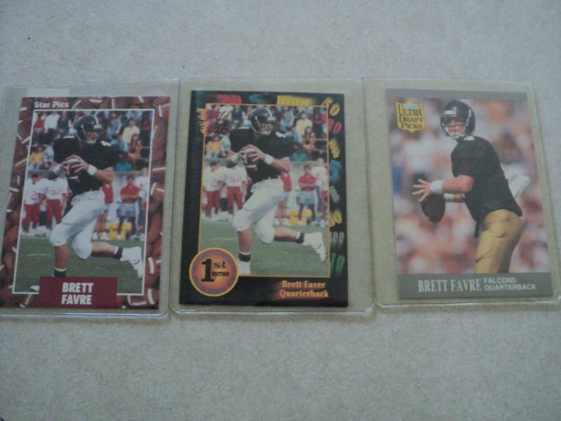 lot 7 image: 3 Brett Favre Rookie Cards...