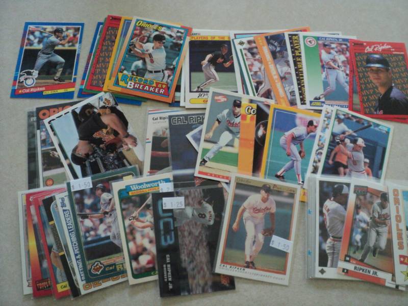 lot 104 image: 50 Cal Ripken Cards...