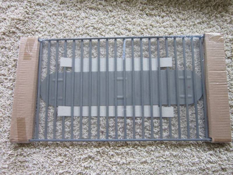 lot 432 image: Case of replacement gas grill lava rock grates