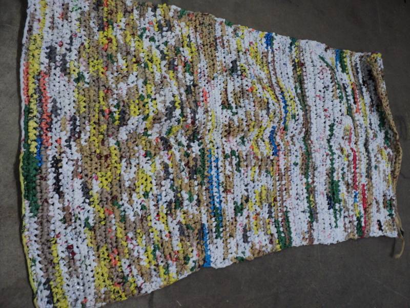 lot 327 image: 37 x 66 Plastic Rug...
