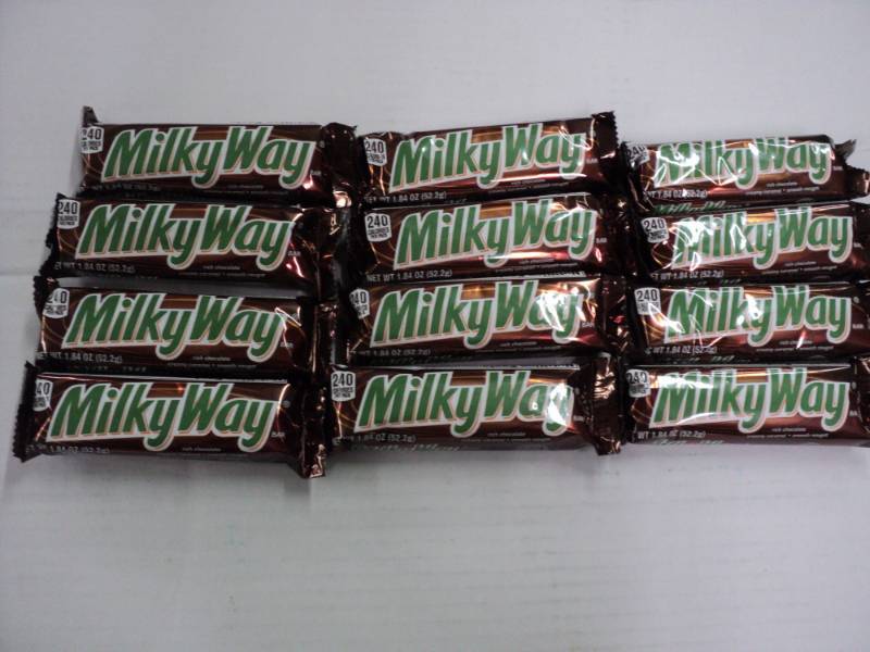 lot 403 image: 12 Milky Way Candy Bars...