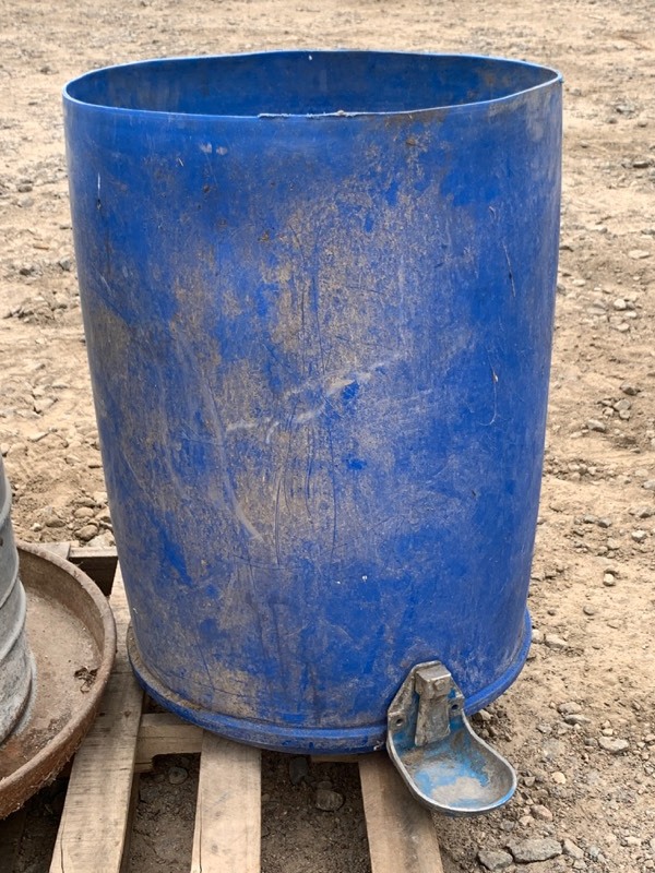 lot 17 image: (2) Barrel Livestock  Poultry Feeders