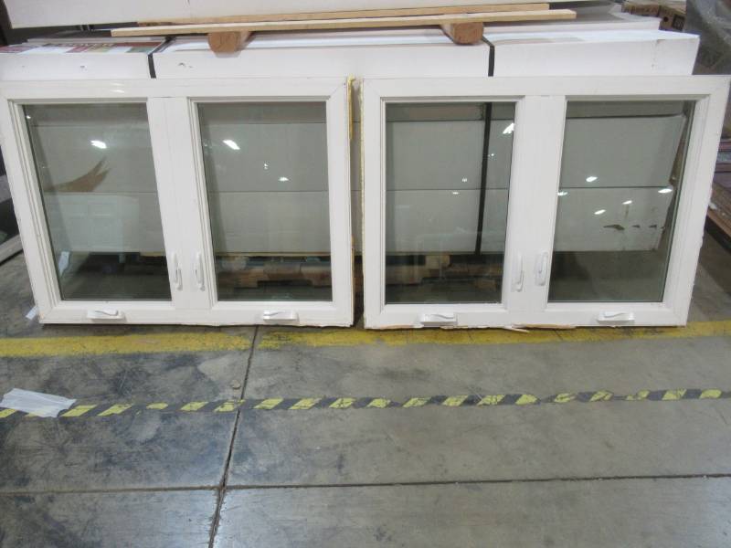 lot 87 image: 2 Pella Double Casement Windows 47 14 X 34 12 X 3 14 Model unknown - One Pane is Cracked
