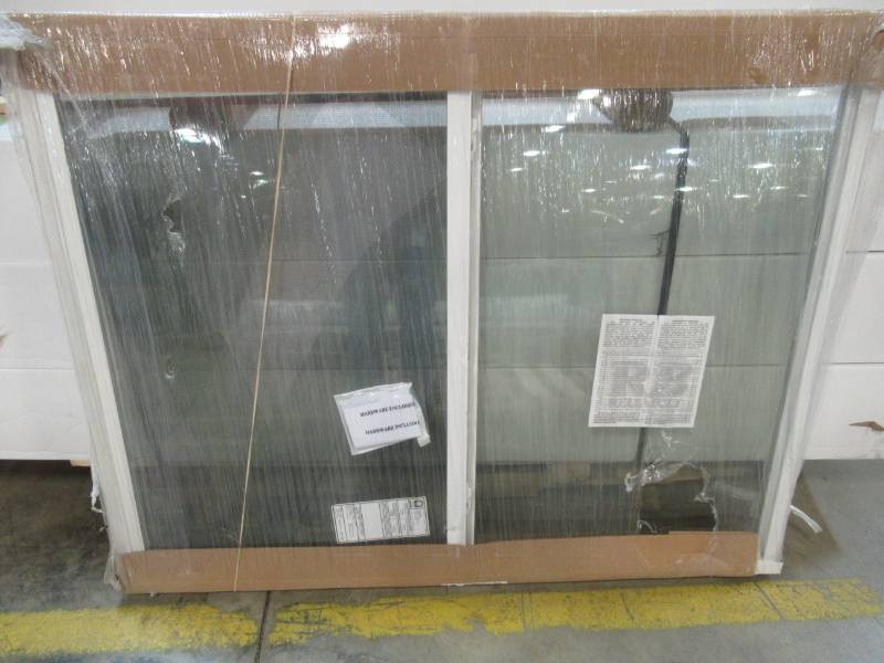 lot 91 image: ReliaBilt Series 3050 Right Operable Vinyl Sliding Window, 57 34 X 46 X 2 12 - Model Unknown - Broken glass