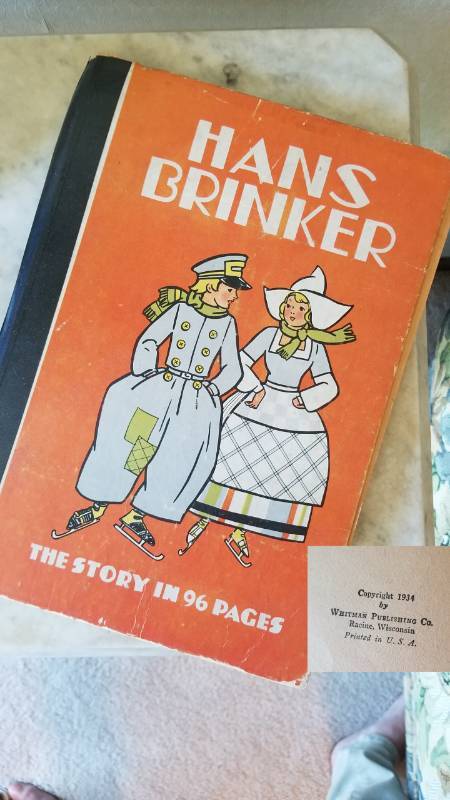 lot 30 image: Lot Antique Skates with 1934 Hans Brinker Childs Book