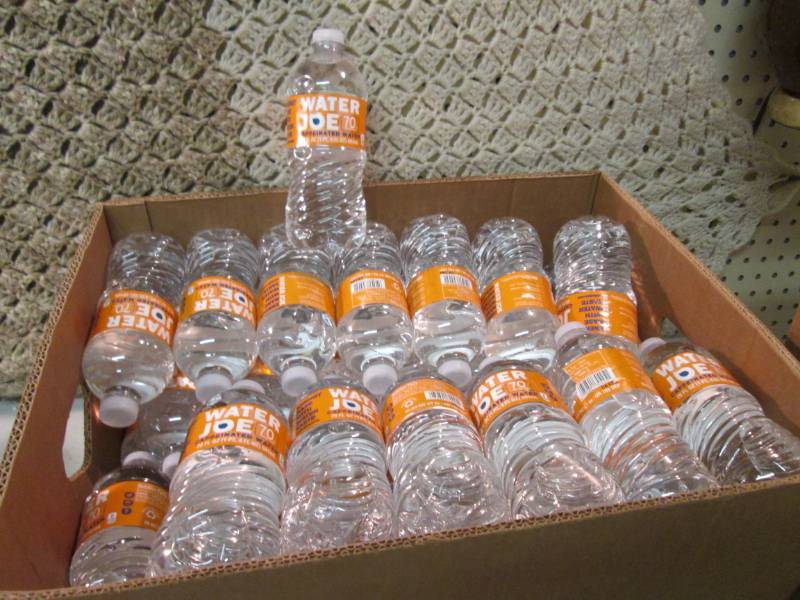 lot 67 image: Banana Box Full of 20 ounce Bottles...