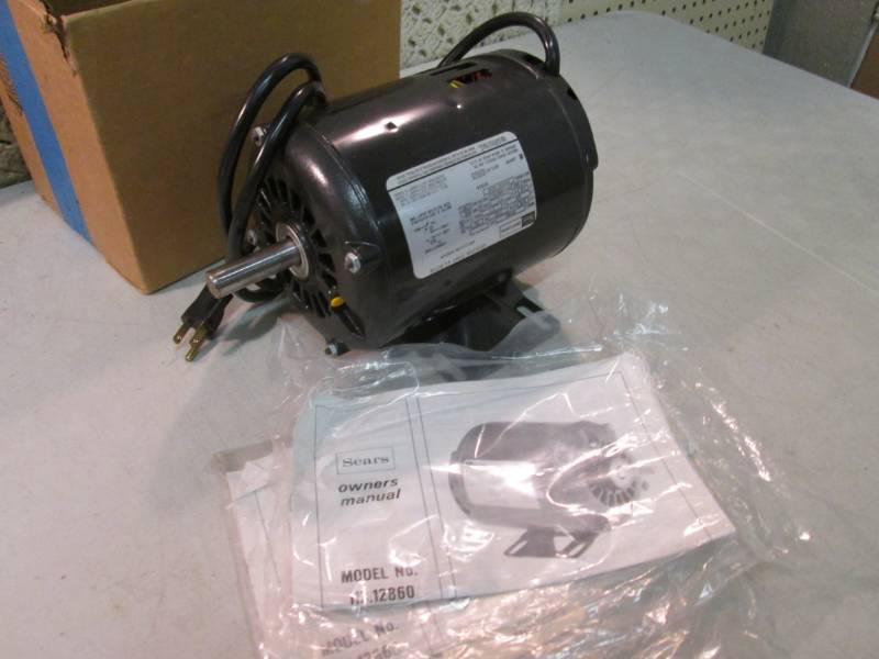 lot 94 image: Craftsman 12 hp Capacitor Start AC...