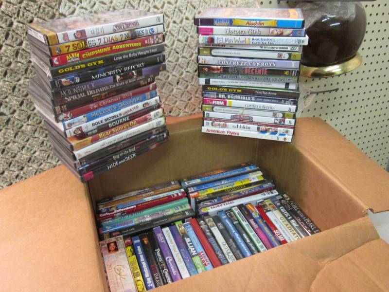 lot 97 image: Lot of 74 DVDs  CLR...