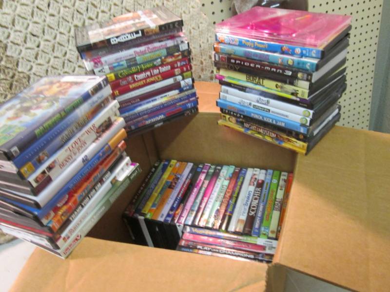 lot 98 image: Lot of 74 DVDs  CLR...